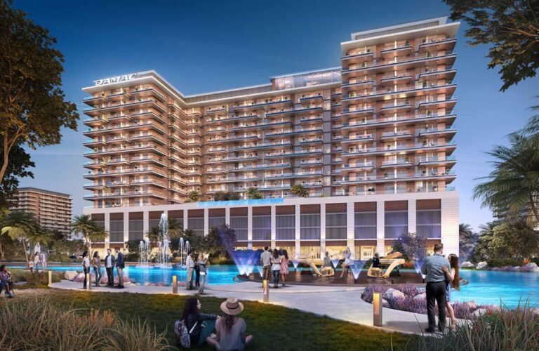 Damac Riverside Views - apartment building with pool and landscaped plaza