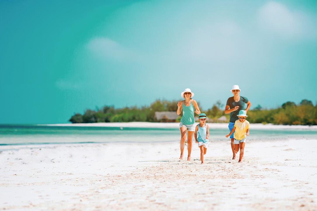 Pelagia at Al Marjan Island - family walking on a white-sand beach
