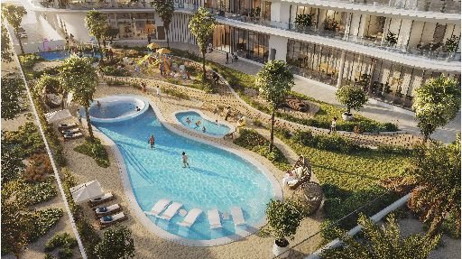 Pelagia at Al Marjan Island - pool with sun loungers in landscaped gardens
