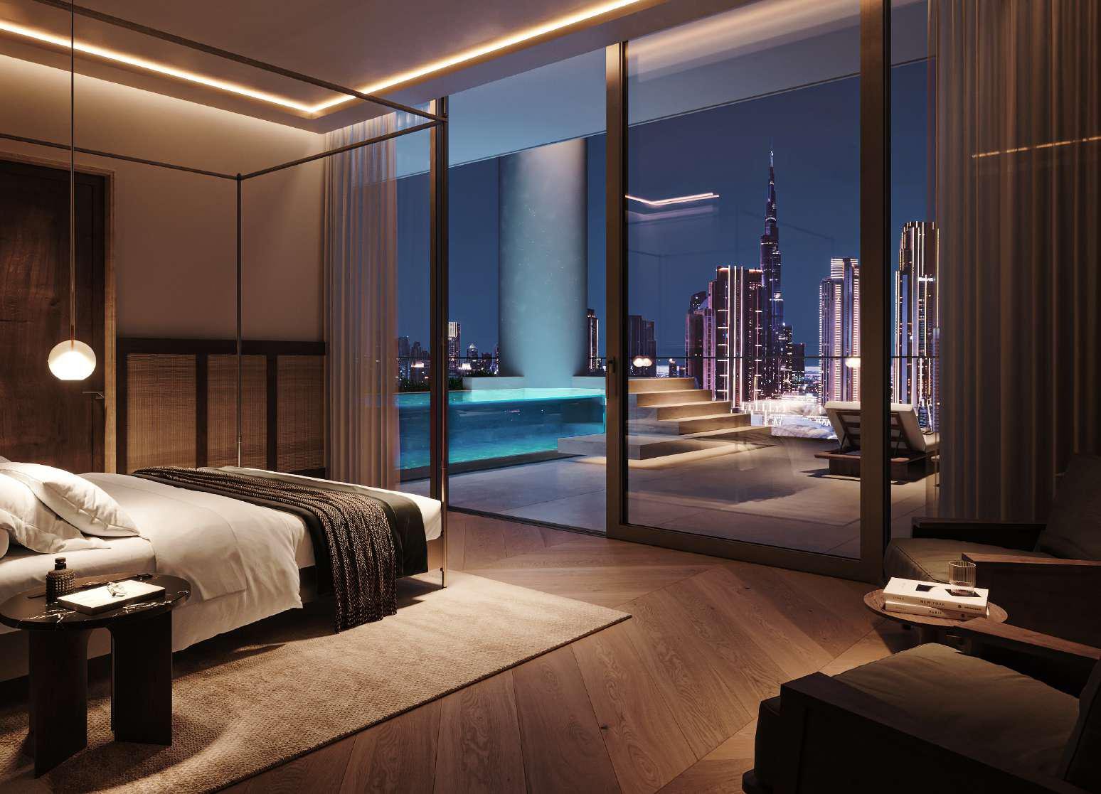 Vela Viento by Omniyat - bedroom with pool view and city lights