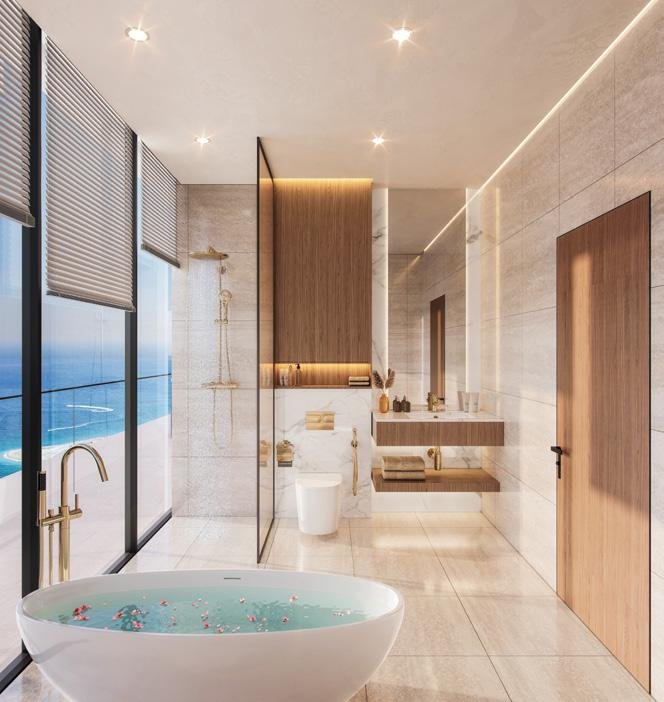 Pelagia at Al Marjan Island - bathroom with glass shower and wood vanity
