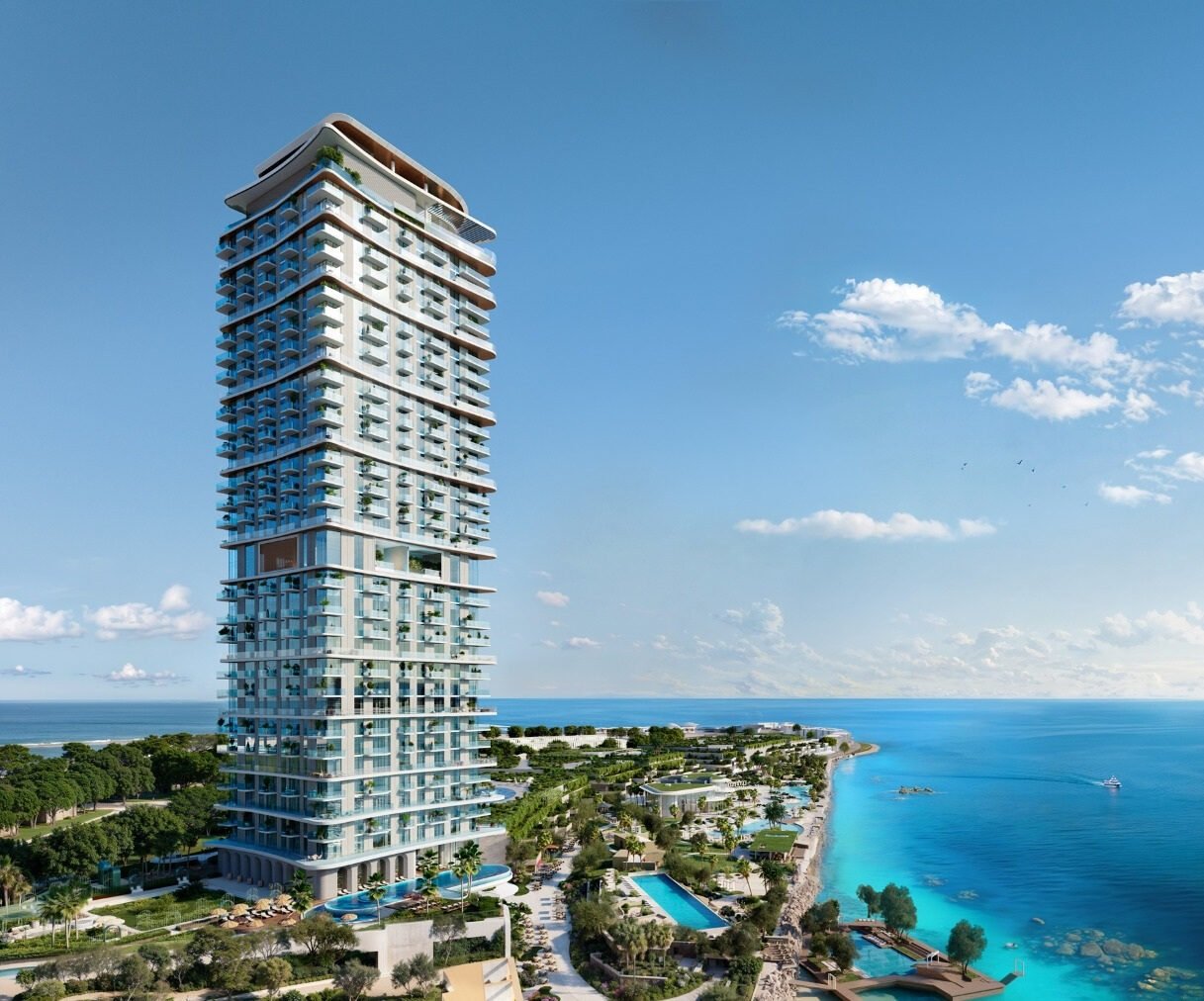 Sensia by Beyond - tall tower beside the turquoise sea