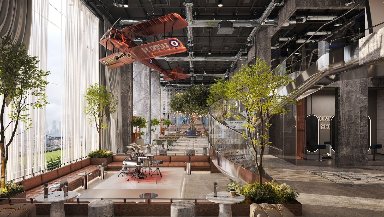 Raw District by Imtiaz Development - double-height atrium with greenery and industrial ceiling